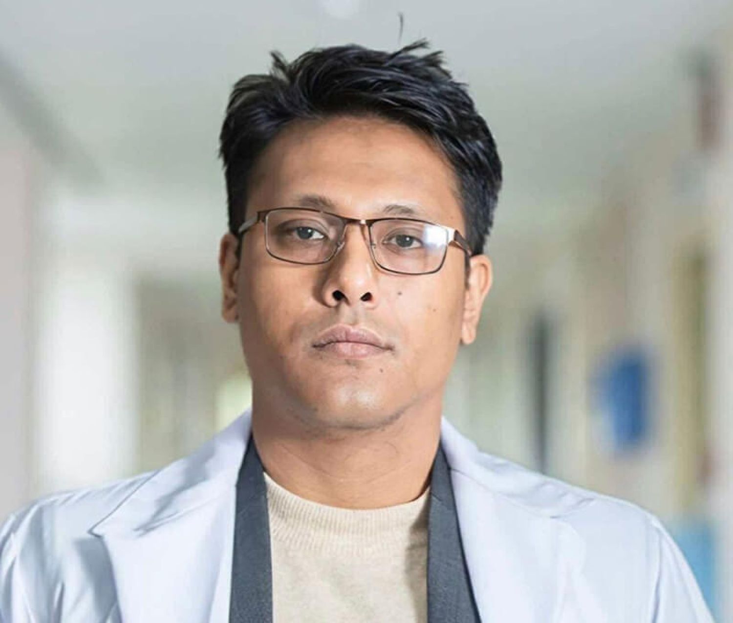 Dr. Robert Singh Maharjan